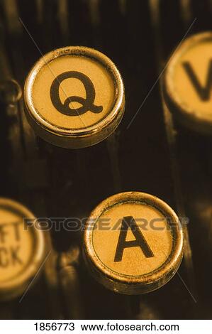 Stock Image - Q and A keys on old manual typewriter. Fotosearch