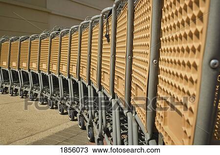 Stock Image - Rows of shopping carts. Fotosearch