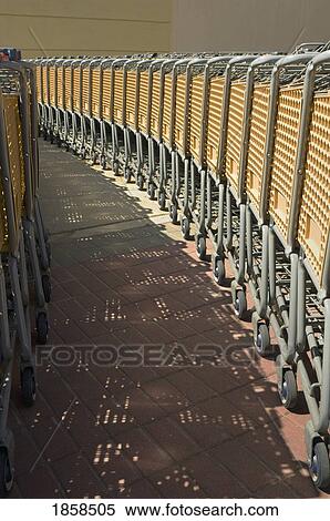 Stock Photography - Rows of shopping carts. Fotosearch
