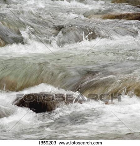 Stock Image - Rushing water, Whistler, British Columbia, Canada. Fotosearch