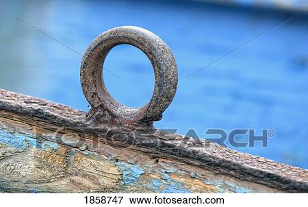 Stock Photo - Rusted ring on boat. Fotosearch