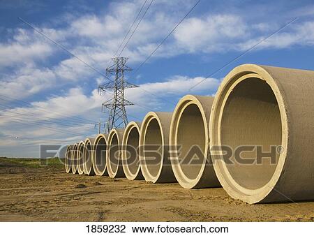 Stock Image - Sewer pipes ready to be installed. Fotosearch
