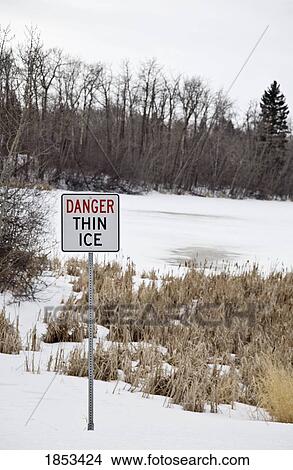 Sign that says "Danger thin ice" View Large Photo Image Picture - Sign that says "Danger thin ice". Fotosearch