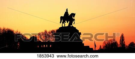 Stock Image - Silhouette of monument to Kaiser Wilhelm, Koblenz, Rheinland-Pfalz, Germany. Fotosearch