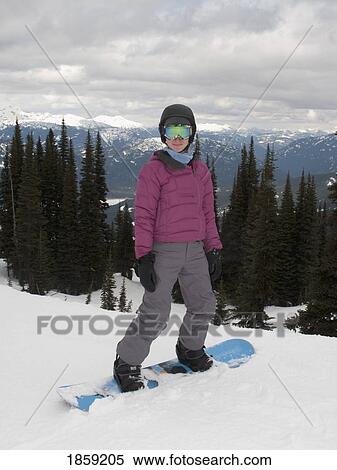 Stock Photography - Snowboarder, Whistler, British Columbia, Canada. Fotosearch