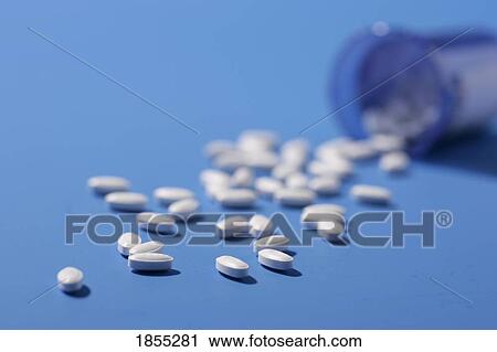 Stock Image - Spilled pills. Fotosearch