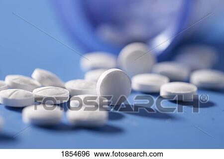 Stock Photograph - Spilled pills. Fotosearch