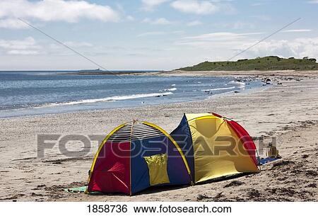 Stock Photograph - Tent on the beach; Northumberland, England. Fotosearch