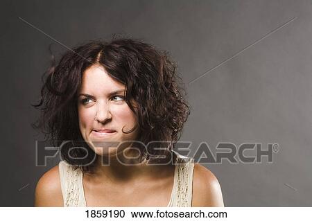 Stock Image - Thinking woman. Fotosearch