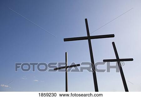 Three crosses against blue sky View Large Photo Image Stock Image - Three crosses against blue sky. Fotosearch