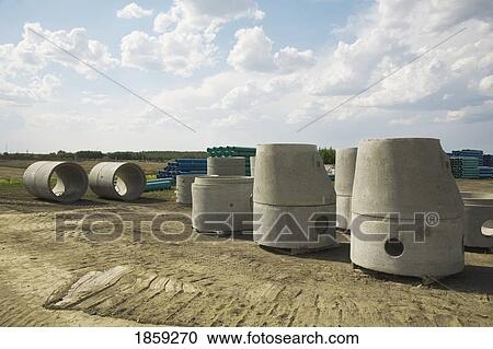 Stock Image - Urban infrastructure materials for sewer and water lines. Fotosearch