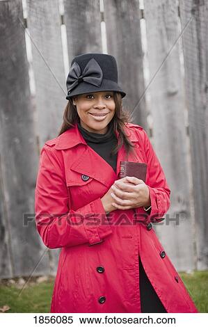 Woman holding Bible View Large Photo Image Stock Photography - Woman holding Bible. Fotosearch