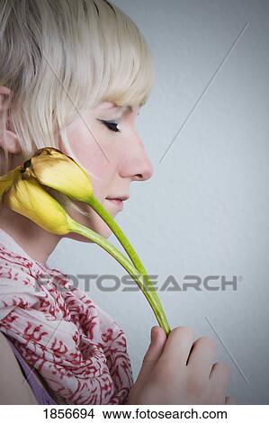 Picture - Woman with flowers. Fotosearch