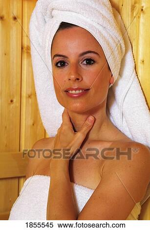 Woman with towel on her head View Large Photo Image Stock Photography - Woman with towel on her head. Fotosearch