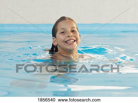 Young girl in swimming pool View Large Photo Image Stock Image - Young girl in swimming pool. Fotosearch