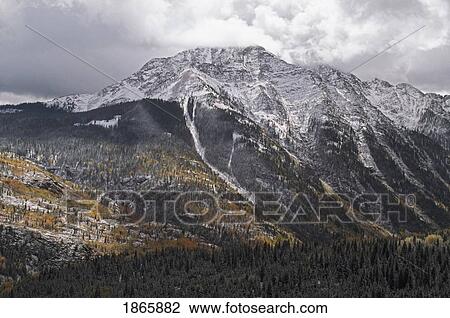 Breaking storm clouds over mountain View Large Photo Image Stock Image - Breaking storm clouds over mountain. Fotosearch