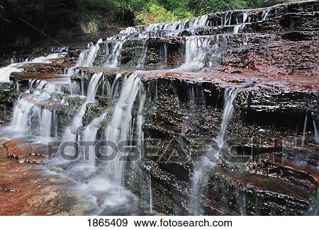 Stock Photo - Cascading falls, North Creek, Zion National Park, Utah, USA. Fotosearch