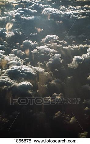 High angle view of low clouds over ocean water View Large Photo Image Stock Photography - High angle view of low clouds over ocean water. Fotosearch
