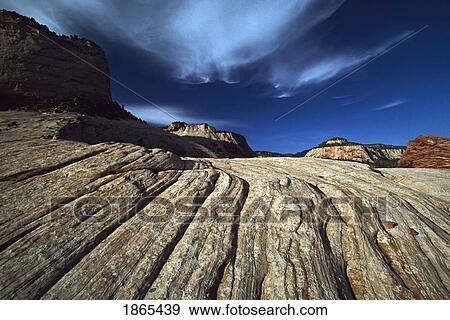 Lines in sandstone reveal ancient sand dunes View Large Photo Image Stock Photo - Lines in sandstone reveal ancient sand dunes. Fotosearch