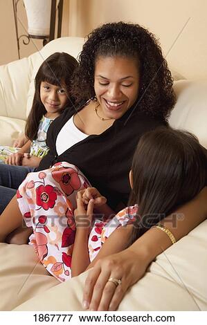 Stock Photo - Mother and daughters. Fotosearch