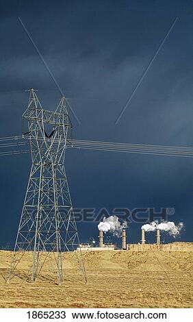 Stock Image - Power lines and a power plant. Fotosearch