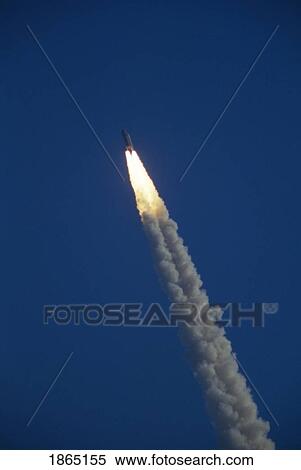 Stock Photography - Space shuttle plume smoke trail, Cape Canaveral, Florida, USA. Fotosearch