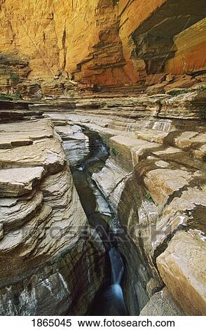 Stock Photography - Stream passing through strata in Matkatamiba Canyon, Grand Canyon National Park, Arizona, USA. Fotosearch