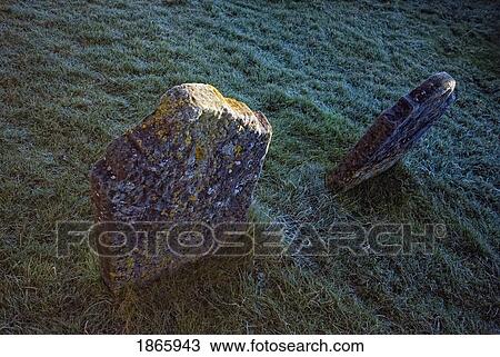 Two stones in the ground View Large Photo Image Stock Image - Two stones in the ground. Fotosearch