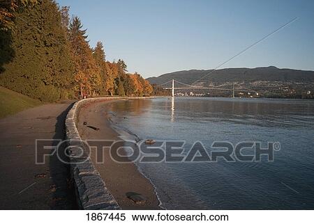 Stock Photography - Walking path along water, Stanley Park, Vancouver, British Columbia. Fotosearch