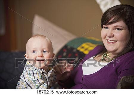 a mother with her baby boy View Large Photo Image Stock Photography - a mother with her baby boy. Fotosearch