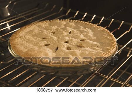 baked pie in the oven View Large Photo Image Stock Photo - baked pie in the oven. Fotosearch