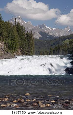 Stock Image - bow falls, bow river, banff national park, alberta, canada. Fotosearch