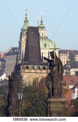 Stock Photo - charles bridge, church spires in the distance, prague, czech republic. Fotosearch