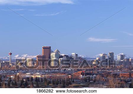 City skyline with mountain backdrop, Calgary, Alberta, Canada View Large Photo Image Stock Image - City skyline with mountain backdrop, Calgary, Alberta, Canada. Fotosearch