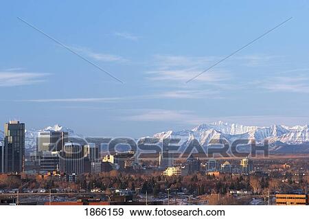 City skyline with mountain backdrop, Calgary, Alberta, Canada View Large Photo Image Stock Photo - City skyline with mountain backdrop, Calgary, Alberta, Canada. Fotosearch
