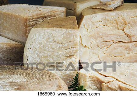 Close-up of large cheese wheels, Ajaccio, Corsica, France View Large Photo Image Stock Image - Close-up of large cheese wheels, Ajaccio, Corsica, France. Fotosearch