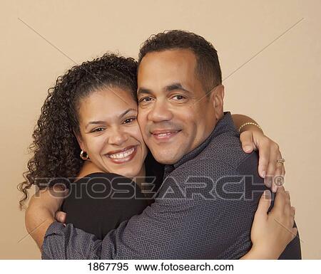 Stock Photography - couple hugging. Fotosearch