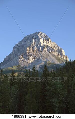 Crowsnest Mountain at sunrise, Crowsnest Pass, Alberta, Canada View Large Photo Image Stock Image - Crowsnest Mountain at sunrise, Crowsnest Pass, Alberta, Canada. Fotosearch