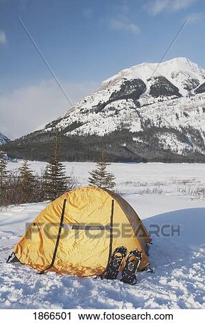 Stock Image - Dome tent in the winter in the mountains. Fotosearch