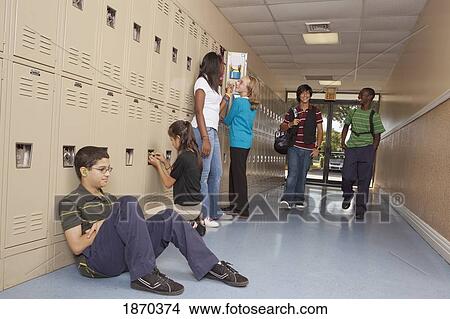 Picture - fort lauderdale, florida, united states of america; students in the hallway of the school. Fotosearch