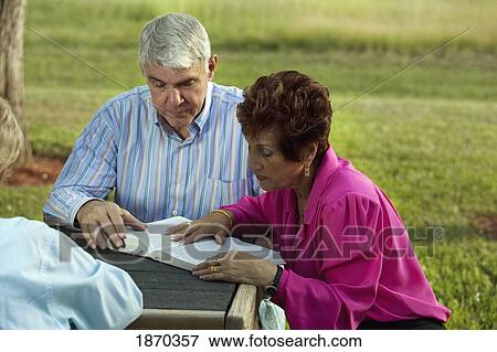 fort lauderdale, florida, united states of america; a couple reading the bible together View Large Photo Image Stock Photo - fort lauderdale, florida, united states of america; a couple reading the bible together. Fotosearch