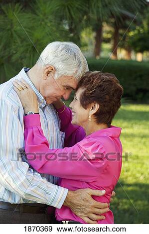 Stock Photo - fort lauderdale, florida, united states of america; a couple looking tenderly at one another. Fotosearch
