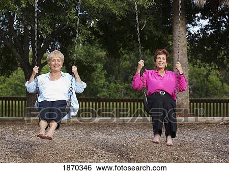 fort lauderdale, florida, united states of america; two women on the swings View Large Photo Image Stock Photograph - fort lauderdale, florida, united states of america; two women on the swings. Fotosearch
