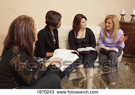 Stock Image - four women studying the bible. Fotosearch