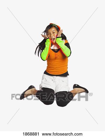 Stock Image - girl jumping. Fotosearch