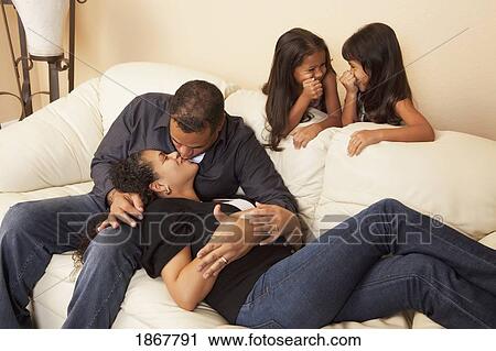 girls watching their parents kissing View Large Photo Image Stock Image - girls watching their parents kissing. Fotosearch