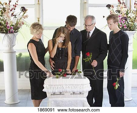 grieving family with an infant's coffin View Large Photo Image Stock Image - grieving family with an infant's coffin. Fotosearch
