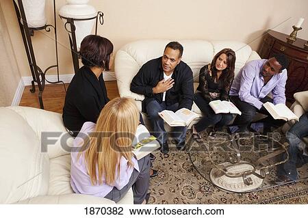group of adults in a home bible study View Large Photo Image Stock Image - group of adults in a home bible study. Fotosearch