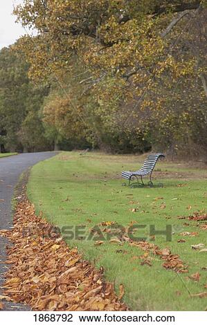 kelso, scottish borders, scotland; a bench along a path in autumn View Large Photo Image Stock Image - kelso, scottish borders, scotland; a bench along a path in autumn. Fotosearch