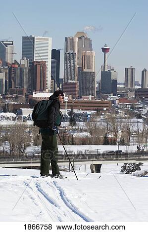Man cross country skiing in Calgary, Alberta, Canada View Large Photo Image Stock Photo - Man cross country skiing in Calgary, Alberta, Canada. Fotosearch